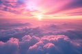 The photo captures a view of the sky from an airplane window during flight, showcasing the clouds and the wing of the aircraft, Royalty Free Stock Photo