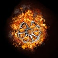Photo of a car wheel on burning fire Royalty Free Stock Photo