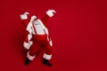 Photo of carefree pensioner man dance have x-mas winter fun wear santa hat costume isolated red color background Royalty Free Stock Photo