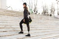 Photo of caucasian disabled woman in sportswear with prosthetic