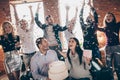 Photo of celebrating best friends arranging unexpected surprise baby party future parents sit sofa hold big cake Royalty Free Stock Photo