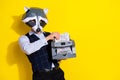 Photo of charismatic banker guy racoon mask count win income salary money wear trendy look isolated over yellow color