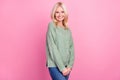 Photo of charming adorable lady pensioner dressed green pullover smiling isolated pink color background