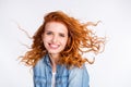 Photo of charming attractive nice young woman smile fly hair blow wind isolated on grey color background