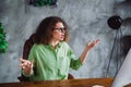 Photo of charming cute woman pen behind ear sitting in chair pretense question office interior workspace workstation