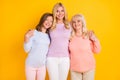 Photo of charming happy three family women good mood smile care isolated on shine yellow color background