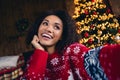 Photo of charming lovely dreamy girl enjoying magic atmosphere holiday event spending advent evening rest holly jolly at