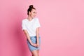 Photo of charming nice adorable lady funny pretty bun summer vacation good mood look shy empty space wear white t-shirt