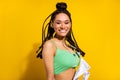 Photo of charming nice afro american young woman smile fly hair isolated on yellow color background