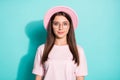 Photo of charming nice young lady look in camera isolated over pastel teal color background