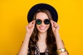 Photo of charming stunning happy face woman wear cool sunglass beaming smile isolated on yellow color background