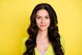 Photo of charming stunning pretty brunette woman smile good mood wavy hairstyle isolated on yellow color background
