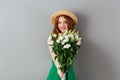 Photo of charming teenage woman with red hair wearing straw hat Royalty Free Stock Photo