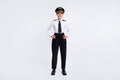 Photo of cheerful charming lady hands hips wear hat aviator uniform pants shoes isolated white color background