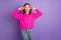 Photo of cheerful cute cool girl make fingers v-signs wear pink jumper jeans isolated on violet color background