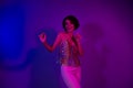 Photo of cheerful energetic lady bachelorette dance on prom party valentine day isolated neon ultraviolet color Royalty Free Stock Photo