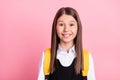 Photo of cheerful happy positive small little girl wear backpack smile isolated on pastel pink color background