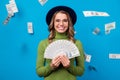 Photo of cheerful lady hold fan dollar bucks rich person freelance salary successful business woman money falling from Royalty Free Stock Photo