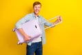 Photo of cheerful positive man trendy outfit toothy smile arm hold suitcase bag ready trip empty space isolated on Royalty Free Stock Photo