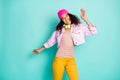 Photo of cheerful positive style casual cute nice pretty carefree girl wearing pants trousers yellow headphones striped Royalty Free Stock Photo