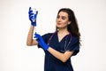 Photo of cheerful woman doc dressed white coat holding syringe smiling isolated grey color background Royalty Free Stock Photo