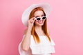 Photo of cheerful young happy woman summer good mood wear sunglass isolated on pink color background