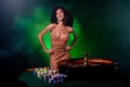 Photo of chic charming attractive lady cunning lucky winning in professional poker game club with neon filter