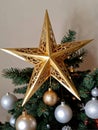 Photo Of Christmas Golden Star Tree Topper. Generative AI Royalty Free Stock Photo