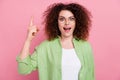 Photo of clever genius woman with perming coiffure dressed shirt in glasses raising finger up get idea isolated on pink Royalty Free Stock Photo