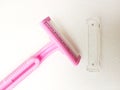 Concpetual, Photo Close Up Pink Woman Shaver at Texturized White Background