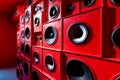 Photo of close up wall with red audio speakers background