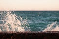 Photo closeup of beautiful clear turquoise sea ocean water surface with ripples and bright splash on seascape background Royalty Free Stock Photo