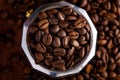 Photo closeup of coffee beans in Aluminium Espresso Coffee Maker. Rusty background. Royalty Free Stock Photo
