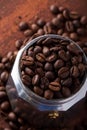 Photo closeup of coffee beans. Rusty background. Royalty Free Stock Photo