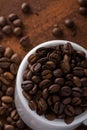 Photo closeup of coffee beans. Rusty background. Royalty Free Stock Photo