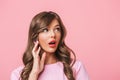 Photo closeup of excited pretty woman with long curly hair in ba Royalty Free Stock Photo