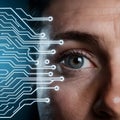 Photo Closeup human eye with circuit board technology concept, symbolizing human machine integration Royalty Free Stock Photo