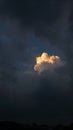 Photo of clouds shining in the sun in the dark Royalty Free Stock Photo