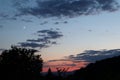 It's a photo of red sky and moon.