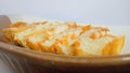 photo of coconut pancong cake in ceramic bowl