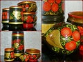 Photo collage Bright wooden kitchen utensils. Khokhloma is an ancient Russian folk craft of the XVII century.