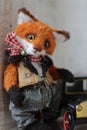 photo of a collectible cunning but kind handmade red fox Teddy, suitable for printing in a calendar card or for