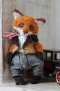 photo of a collectible cunning but kind handmade red fox Teddy, suitable for printing in a calendar card or for