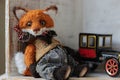 photo of a collectible cunning but kind handmade red fox Teddy, suitable for printing in a calendar card or for