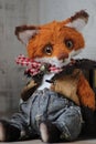 photo of a collectible cunning but kind handmade red fox Teddy, suitable for printing in a calendar card or for