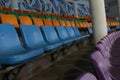 Photo of colorful benches or chairs on the sports stadium Royalty Free Stock Photo