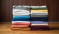 Photo of a colorful display of t-shirts on a rustic wooden table Royalty Free Stock Photo