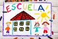 Photo of colorful drawing - Spanish word SCHOOL