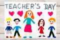 Drawing: Words TEACHERS DAY, teacher and happy children.