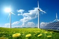 Photo of a colorful meadow with sunflowers, wind turbines and solar panels, importance of renewable energies for the future, Royalty Free Stock Photo